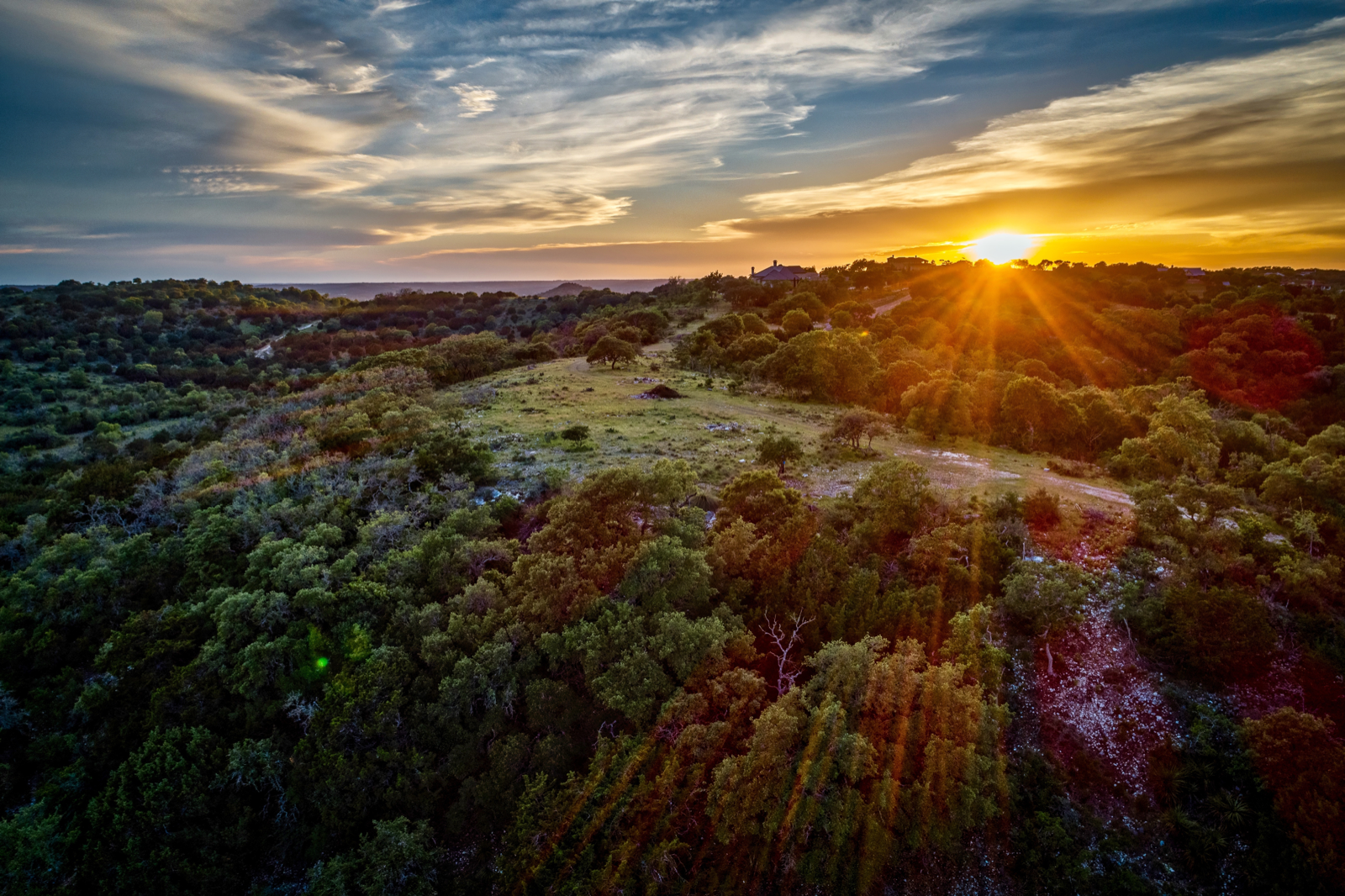 Aerial view of a rural landscape at sunset